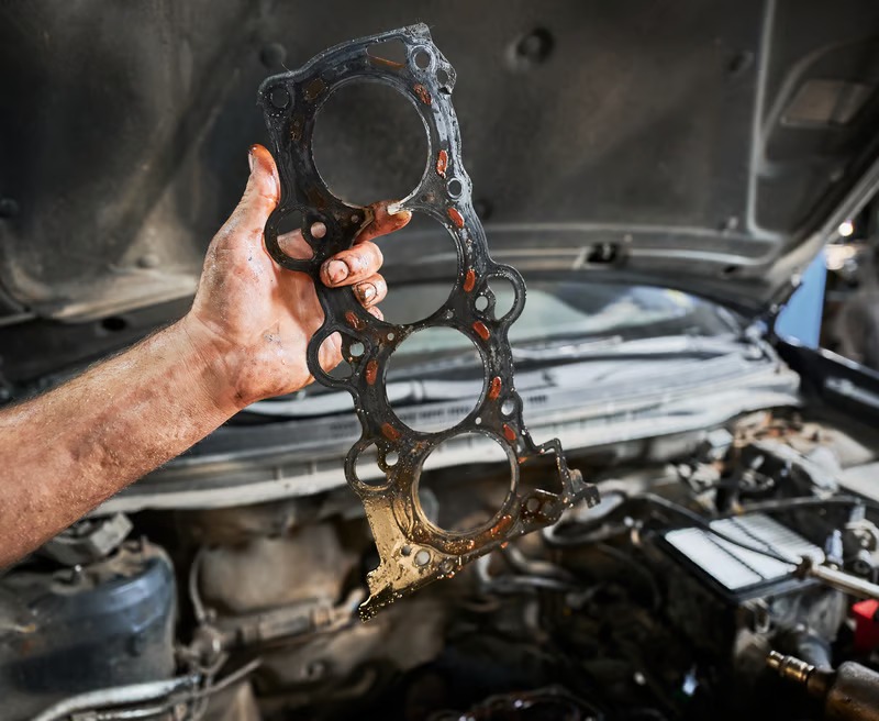 How much does a head gasket repair cost versus a full engine rebuild?